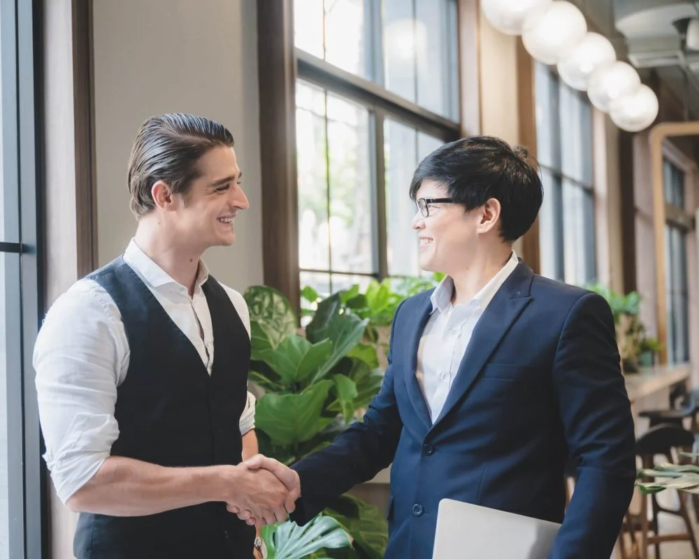 Staffing services in Orange County – employer and staffing partner shaking hands